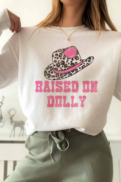 RAISED ON DOLLY GRAPHIC SWEATSHIRT